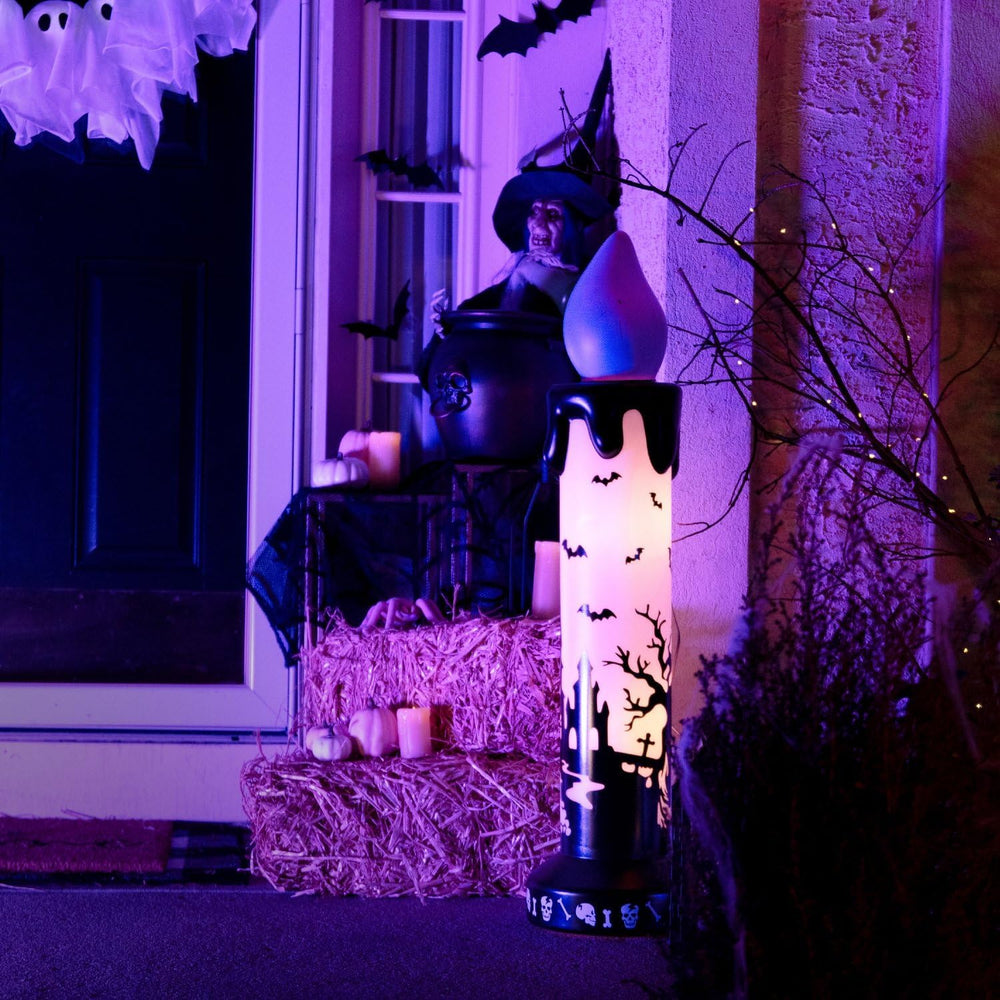 Haunted Hill Farm 3.3-Ft. Purple-Wick LED Candle Blow Mold for Halloween