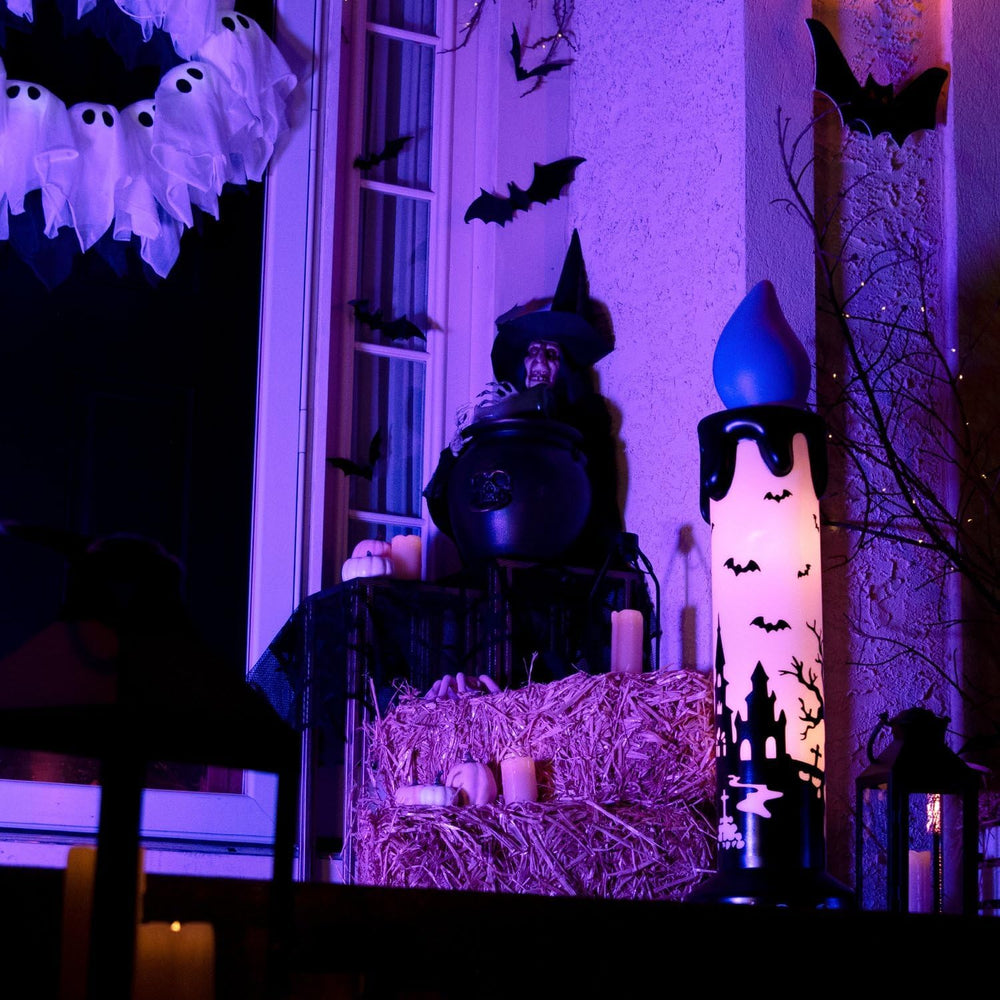 Haunted Hill Farm 3.3-Ft. Purple-Wick LED Candle Blow Mold for Halloween